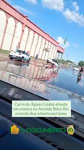 Carro da Águas Cuiabá afunda em cratera na Avenida Beira Rio e trecho fica coberto por lama